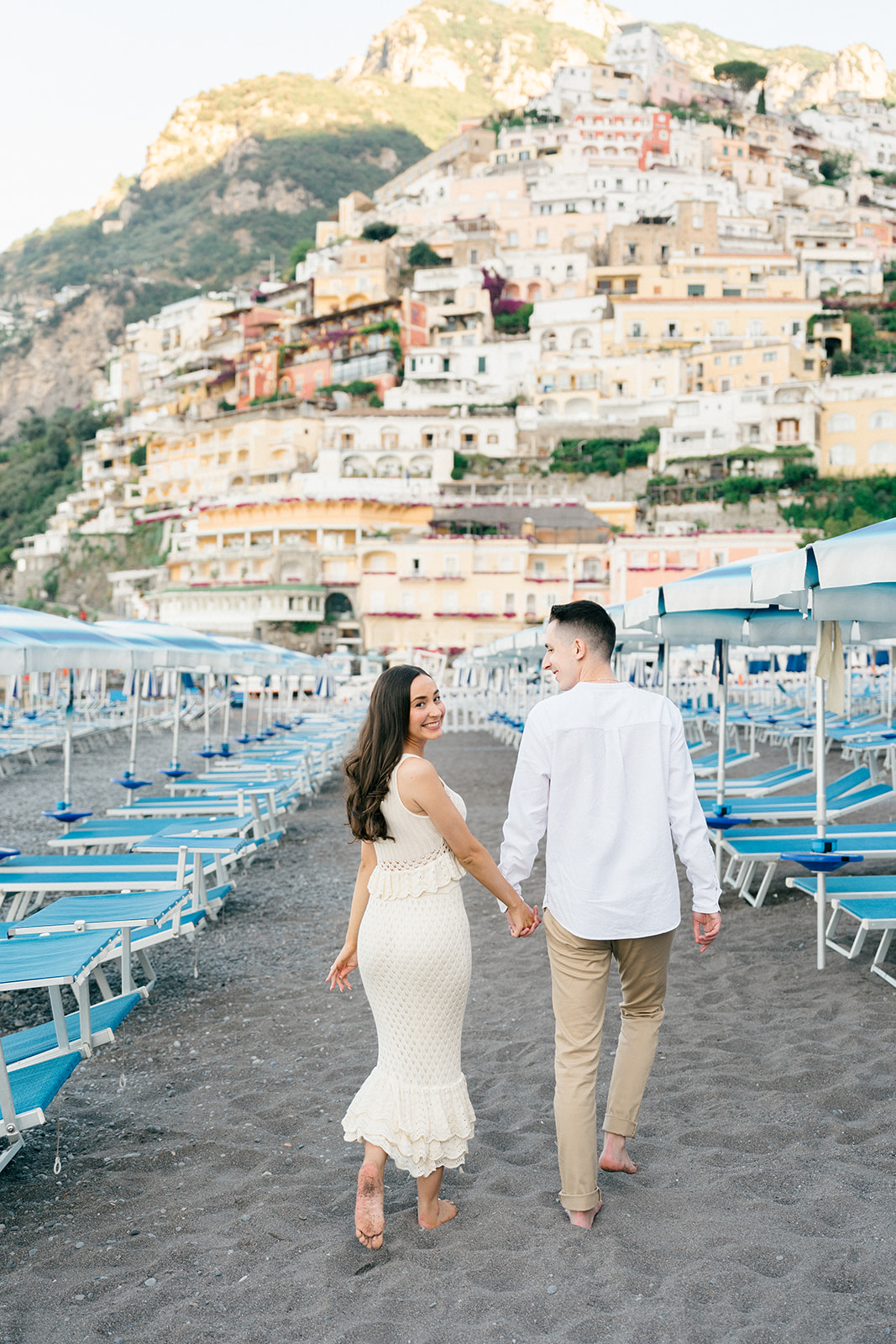 candid engagement photo of the happy couple