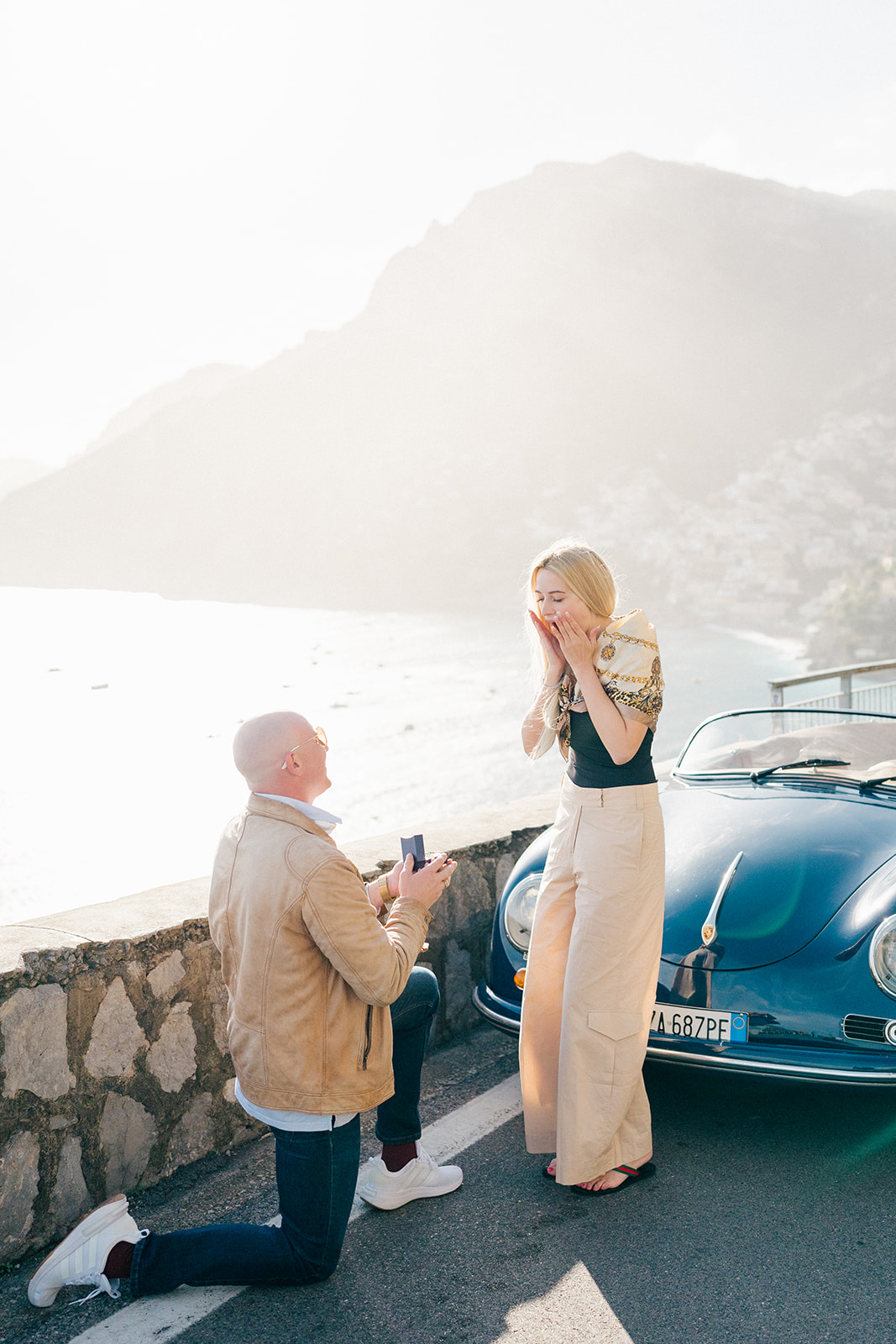 surprise proposal in Positano with a vintage porche car