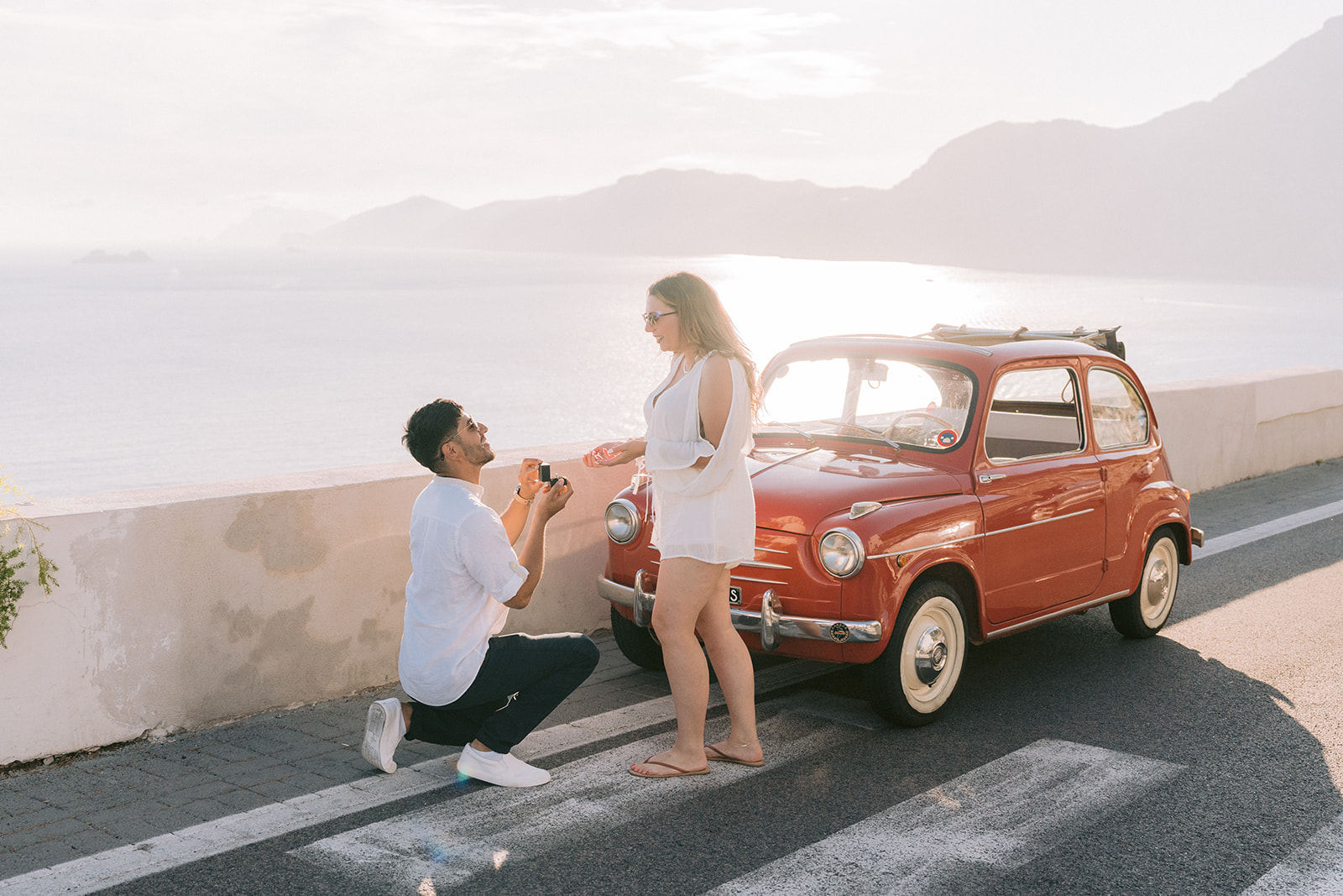 surprise proposal with a vintage Italian car