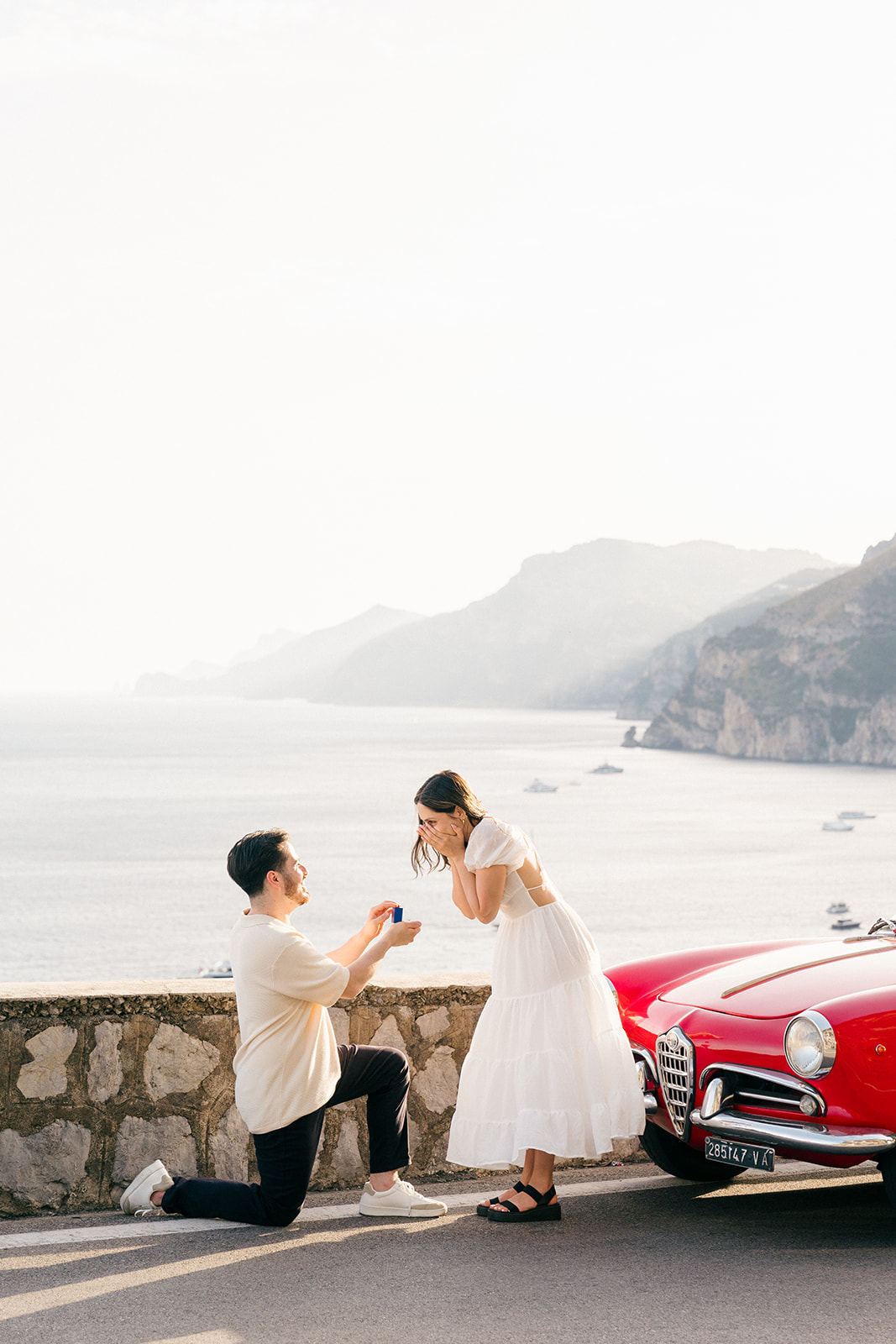 surprise proposal in Positano with a vintage car