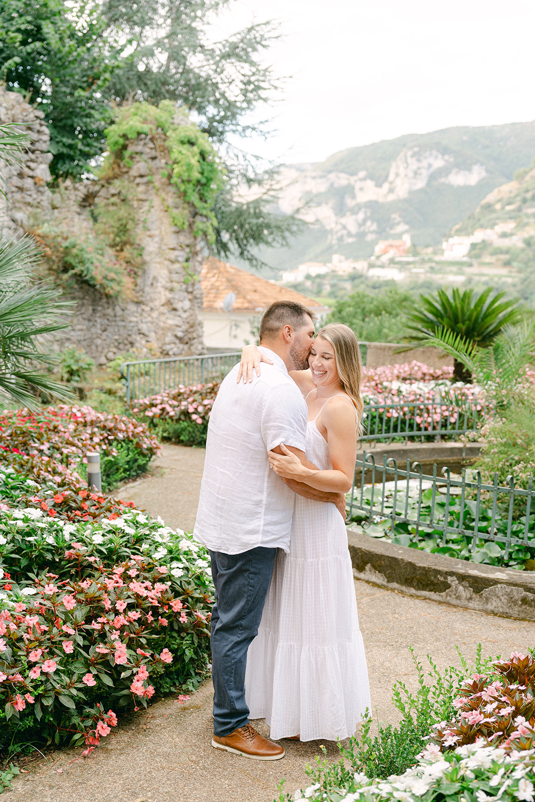 romantic couple pose in the garden engagement photshoot