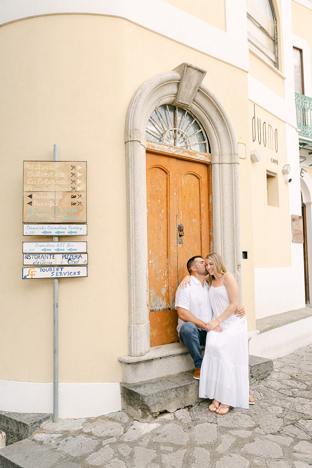couple sitting at the corner street of Ravello