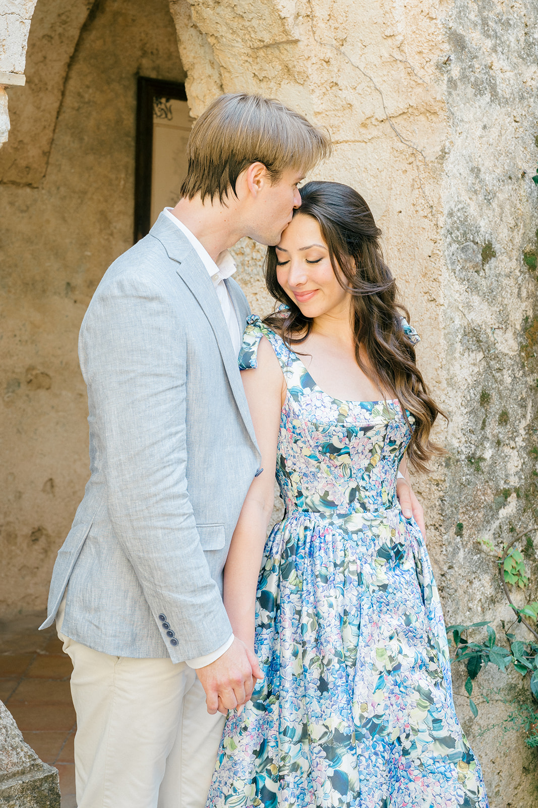 couple wearing matching outfit for their engagement shoot