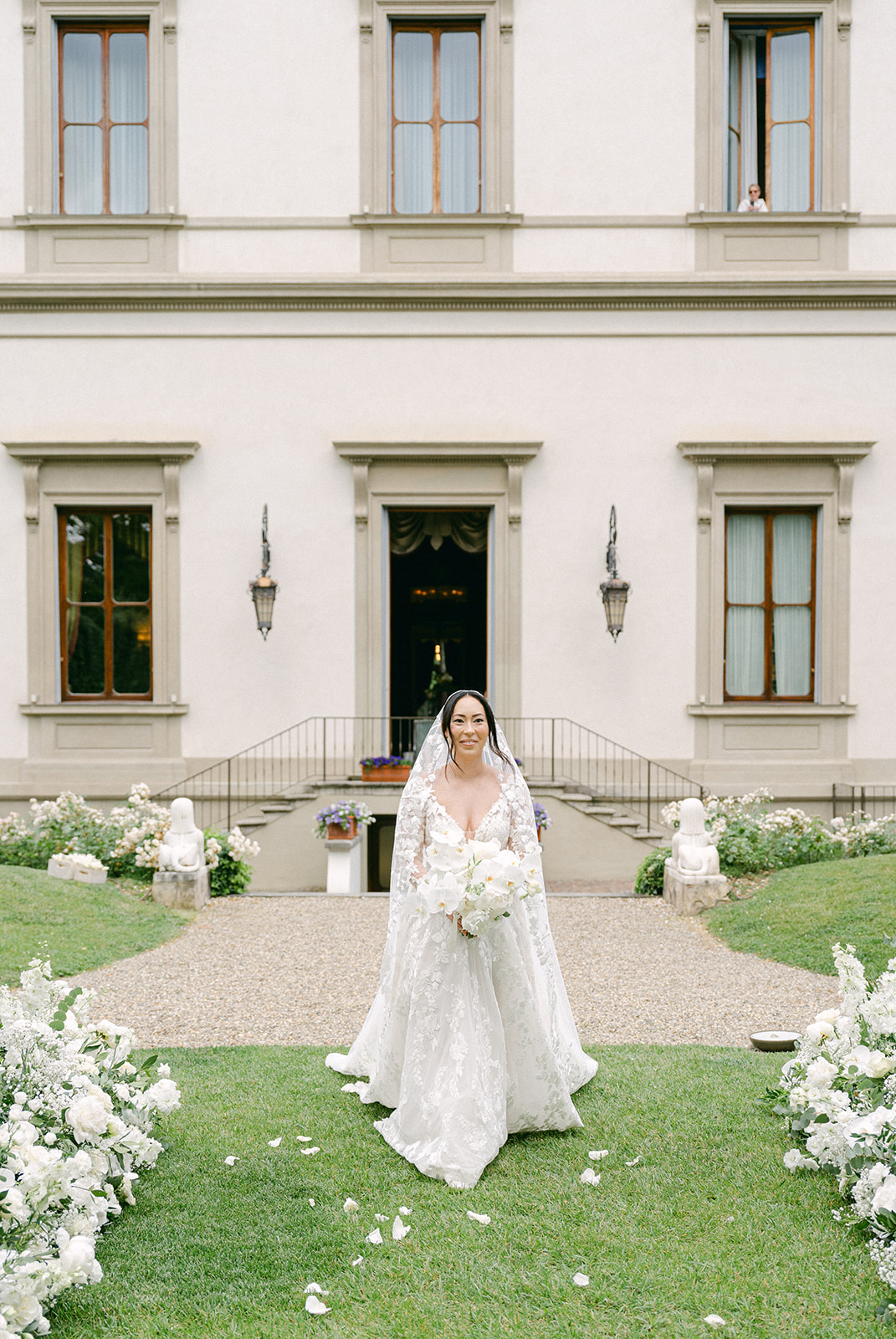 bride walking down the aisle during wedding ceremony