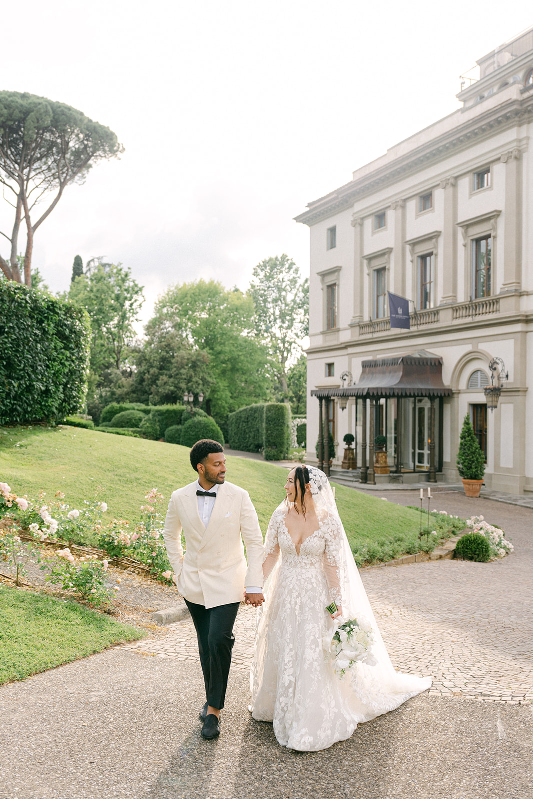 outdoor wedding photo of the wedding couple out in front of Villa Cora