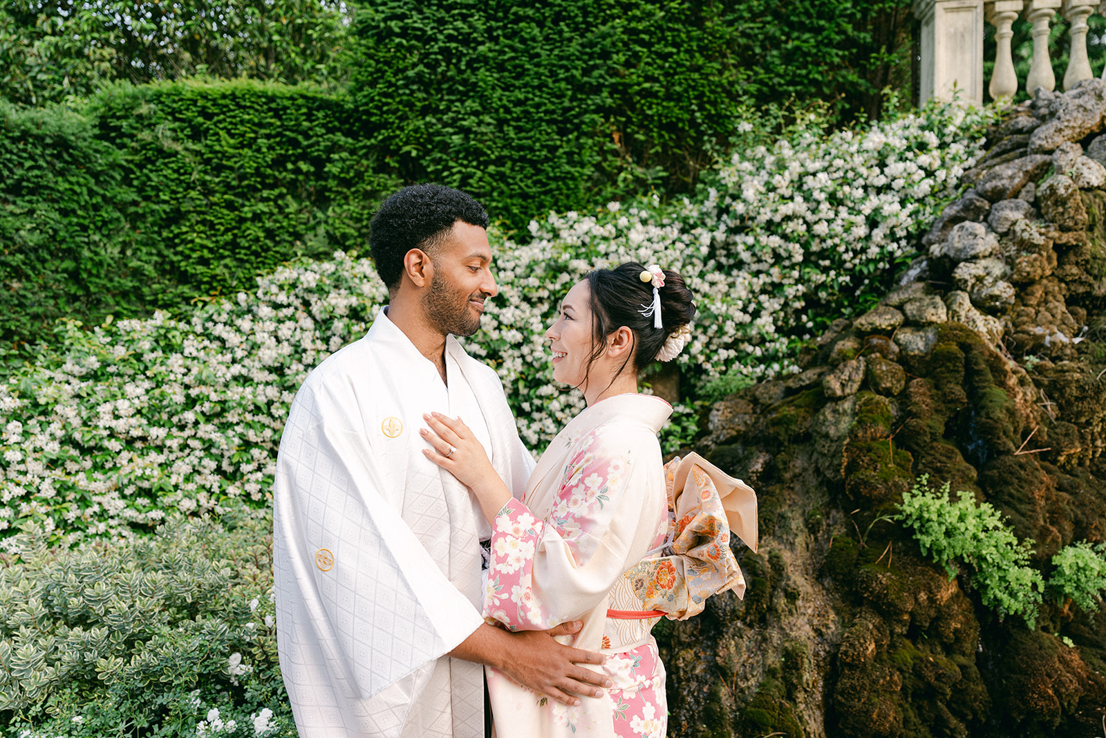bride and groom portraits wearing Japanese wedding attire in the garden of Villa Cora, Tuscany