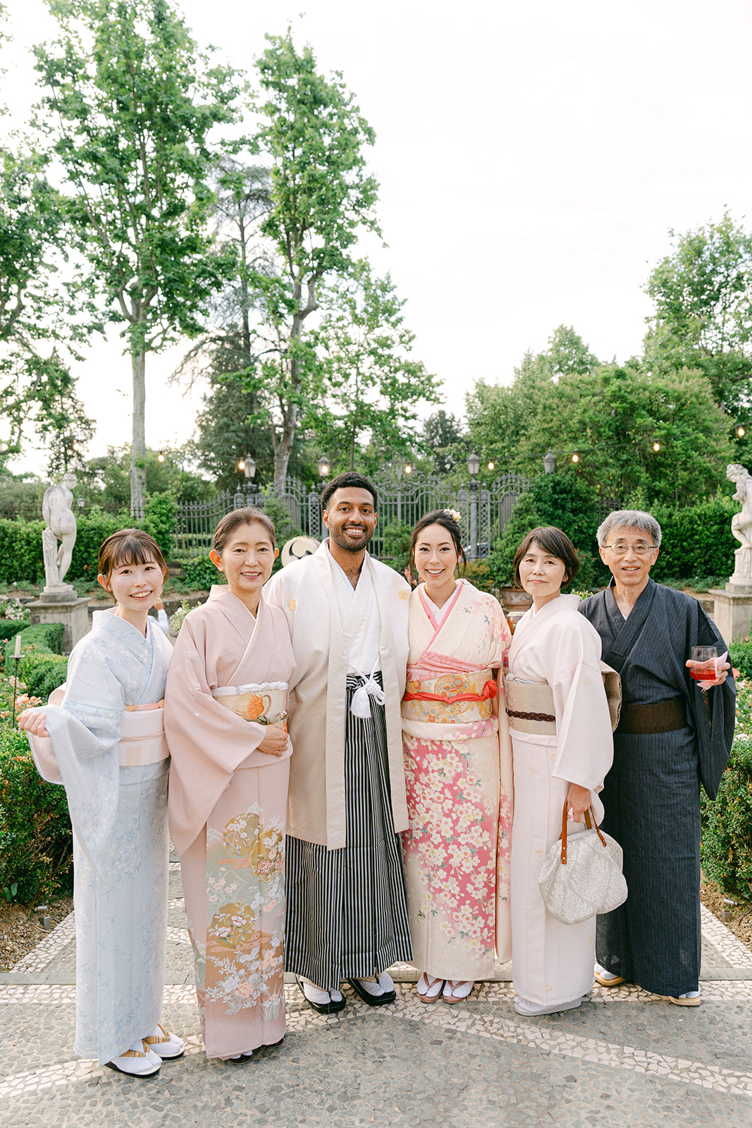 A family portrait during the Japanese wedding ceremony and the family is wearing full tradition Japanese attire