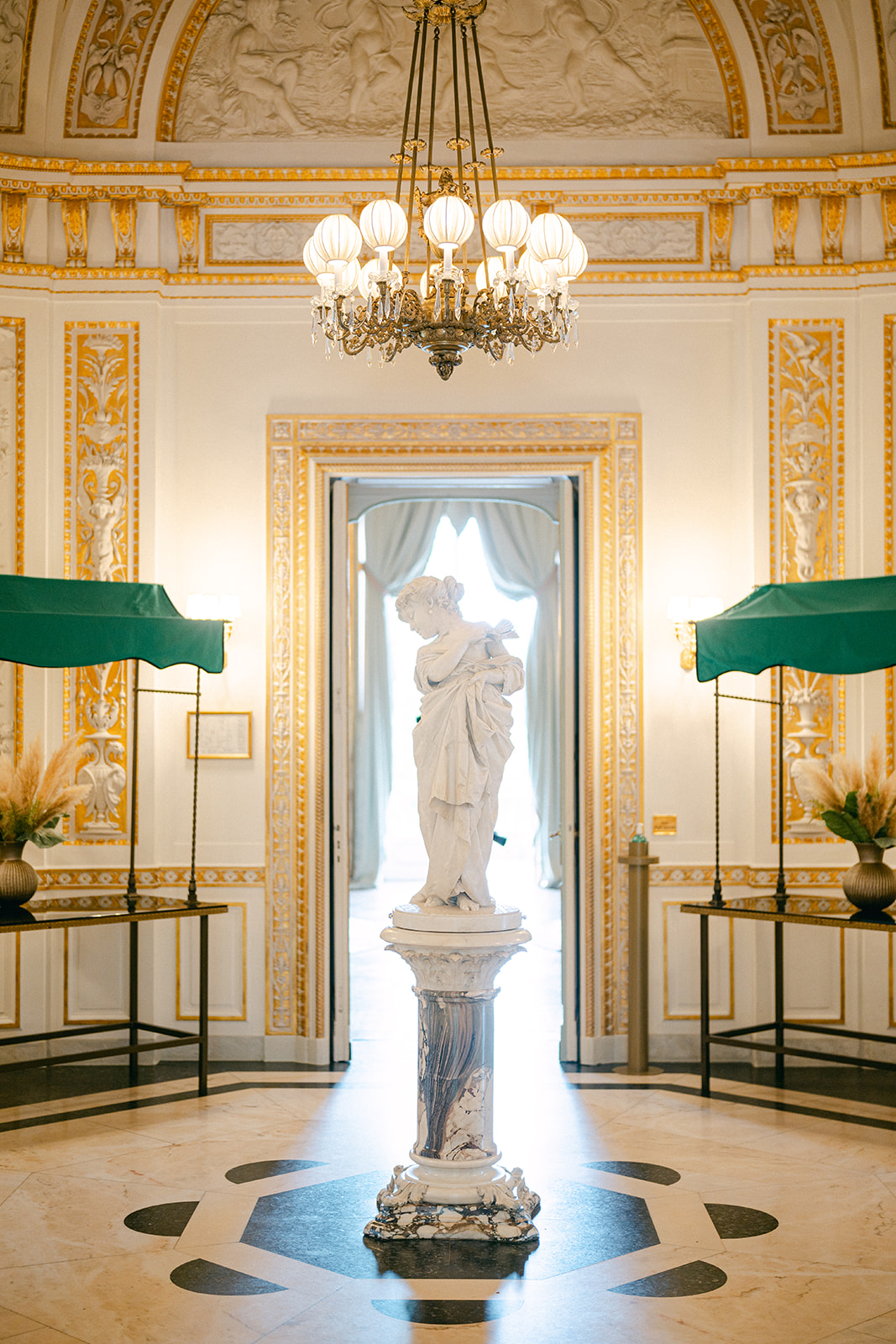 a statue in the living room of Villa Cora, Tuscany