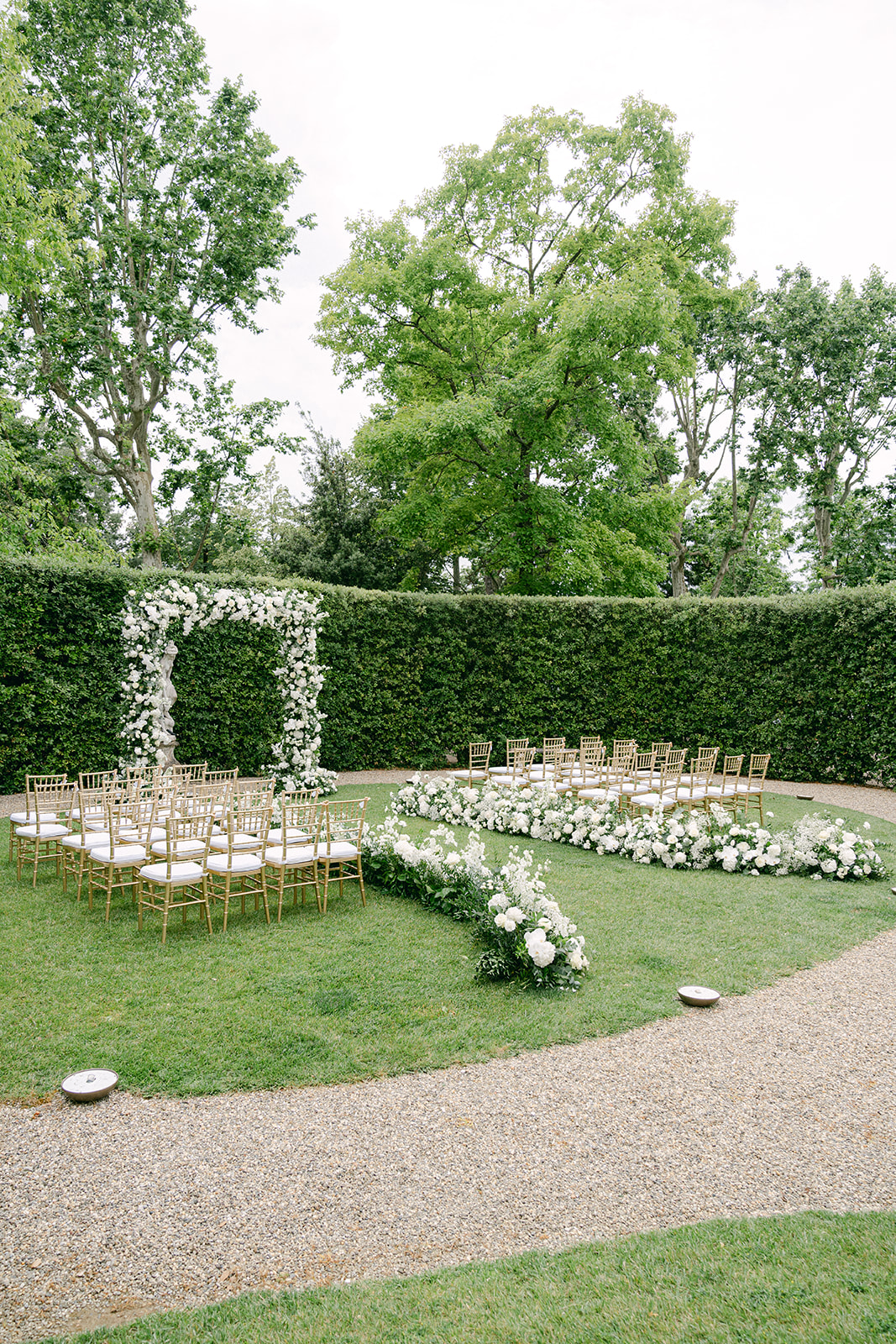 intimate wedding ceremony setup with elegant and simple wedding flowers in Italy
