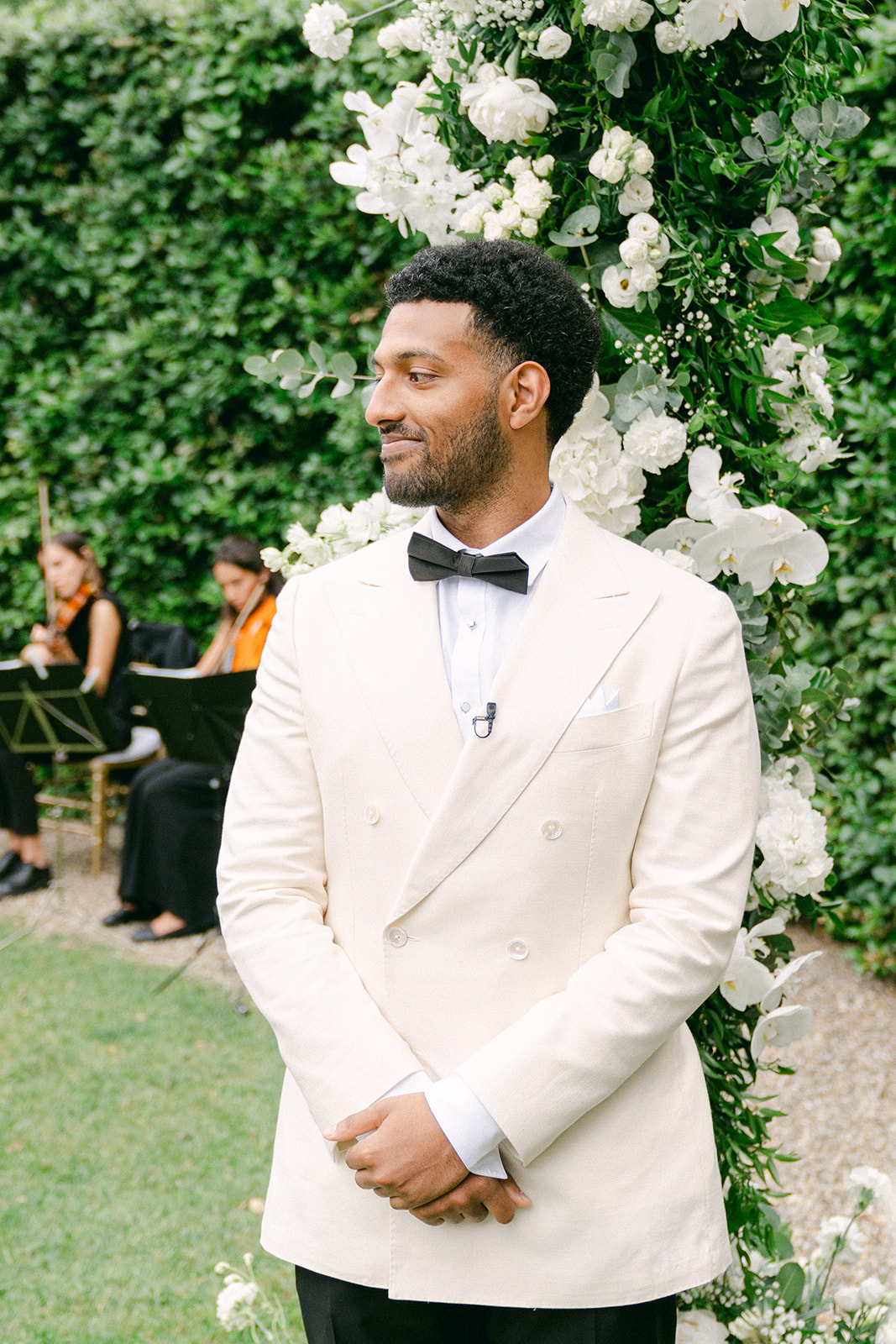 groom smiling and getting emotional during wedding ceremony
