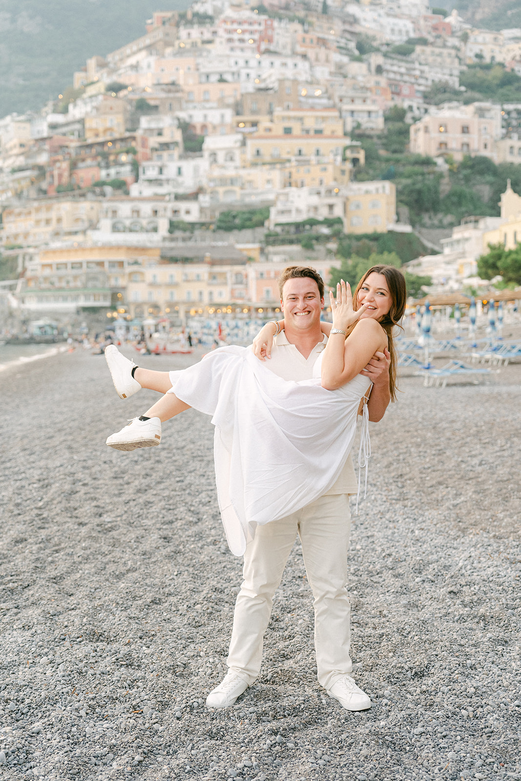 fun engagement poses on the beach