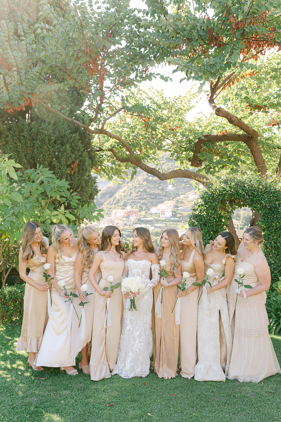 bride and bridesmaids pictures outdoor in Villa Eva
