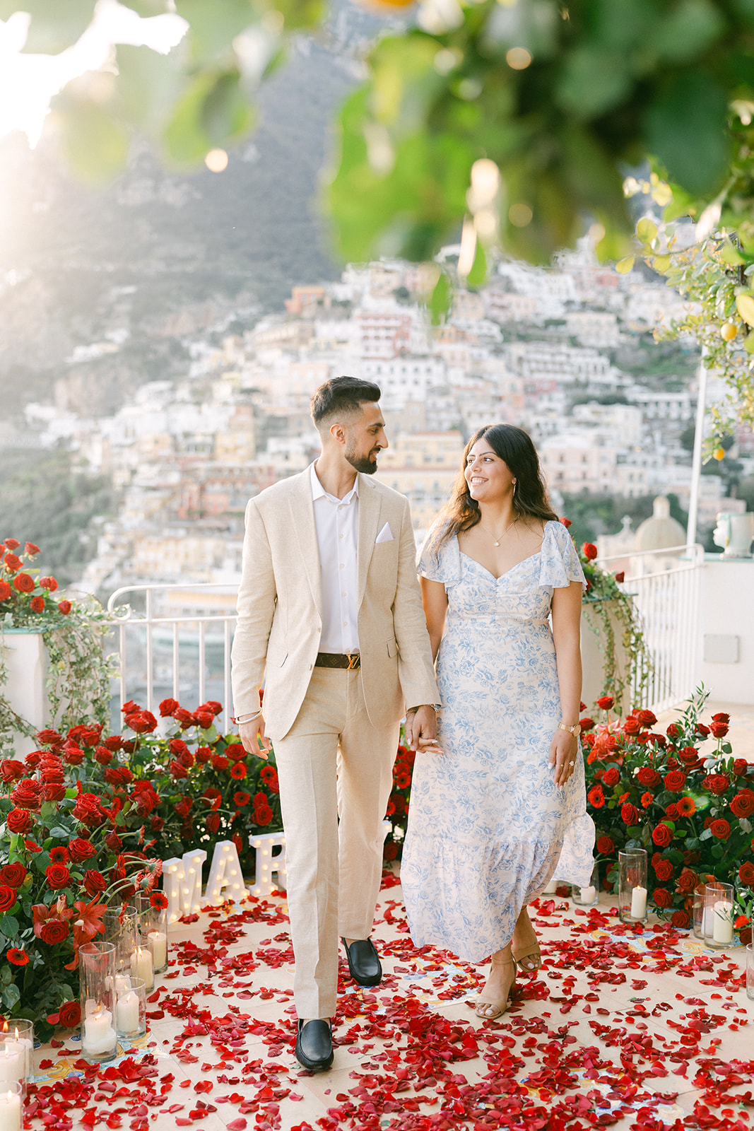 Private proposal in Positano with luxury rose petals