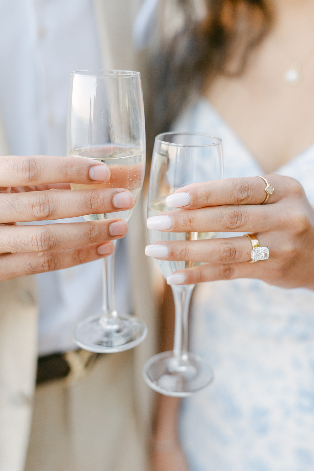 engagement photo of two champagne glasses