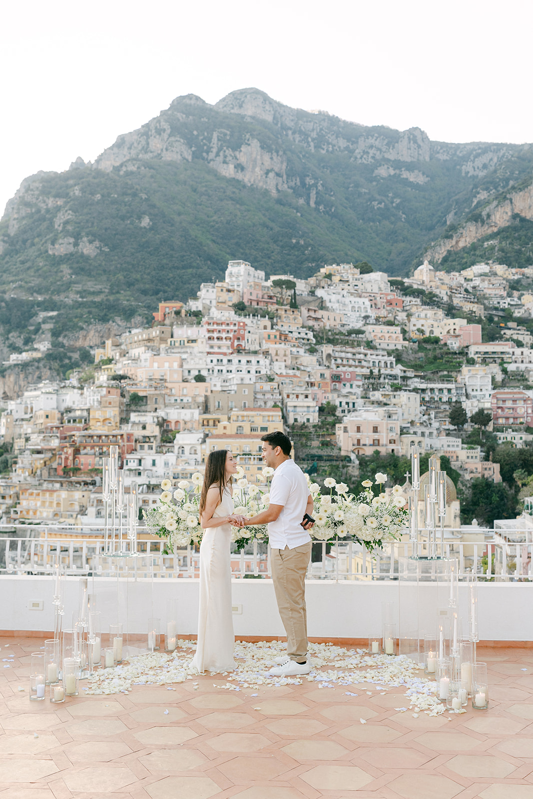 quiet luxury wedding proposal setup with white flowers in Amalfi Coast