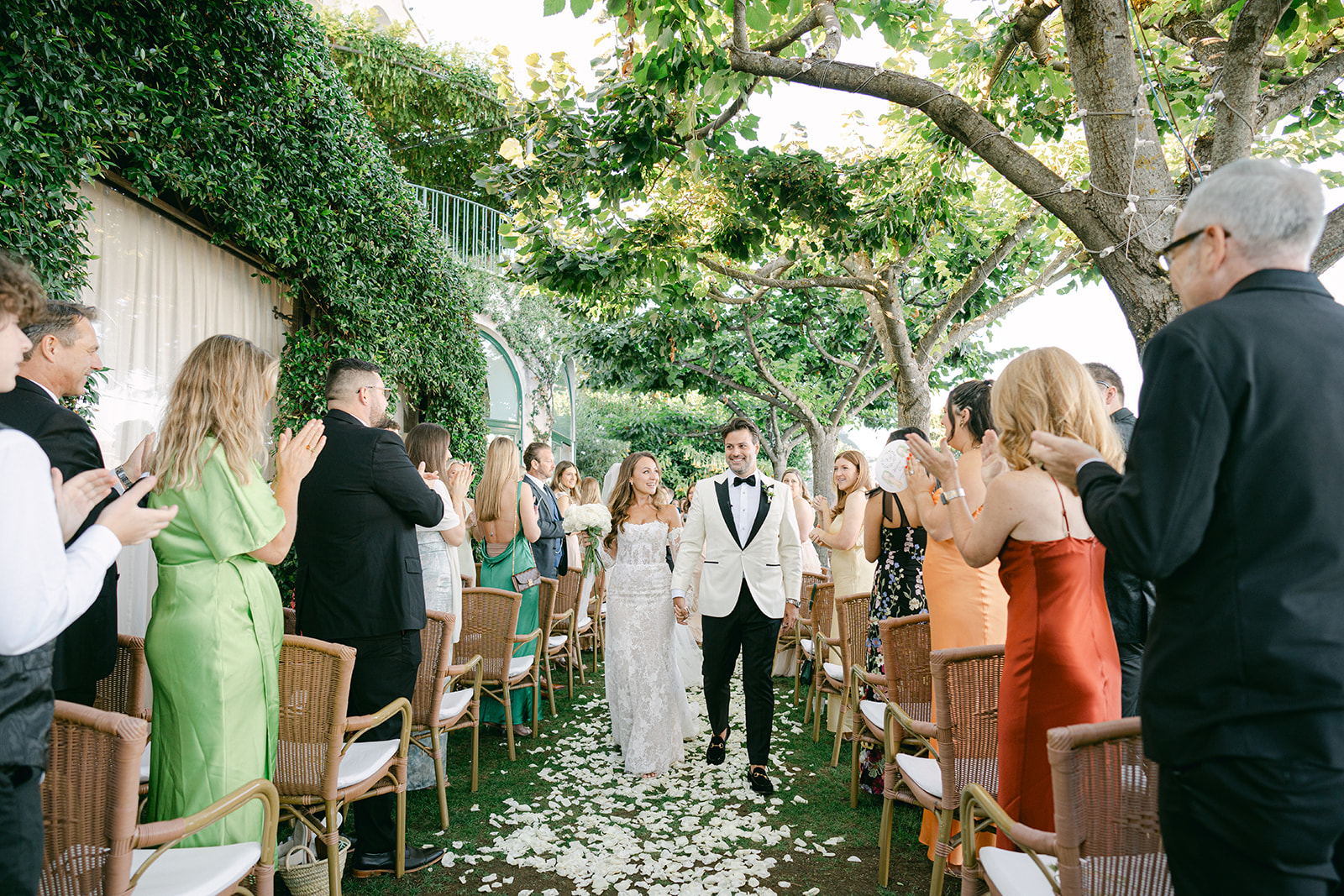 bride and groom walking off the wedding ceremony aisle 