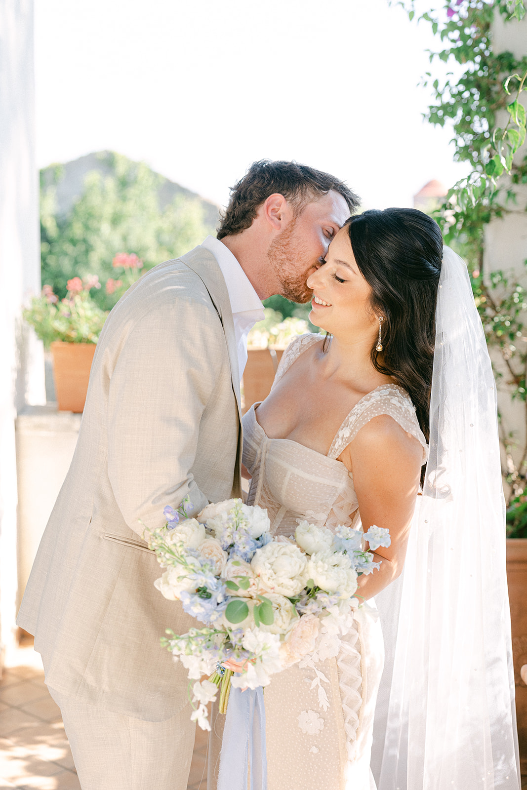 candid wedding photo of bride and groom