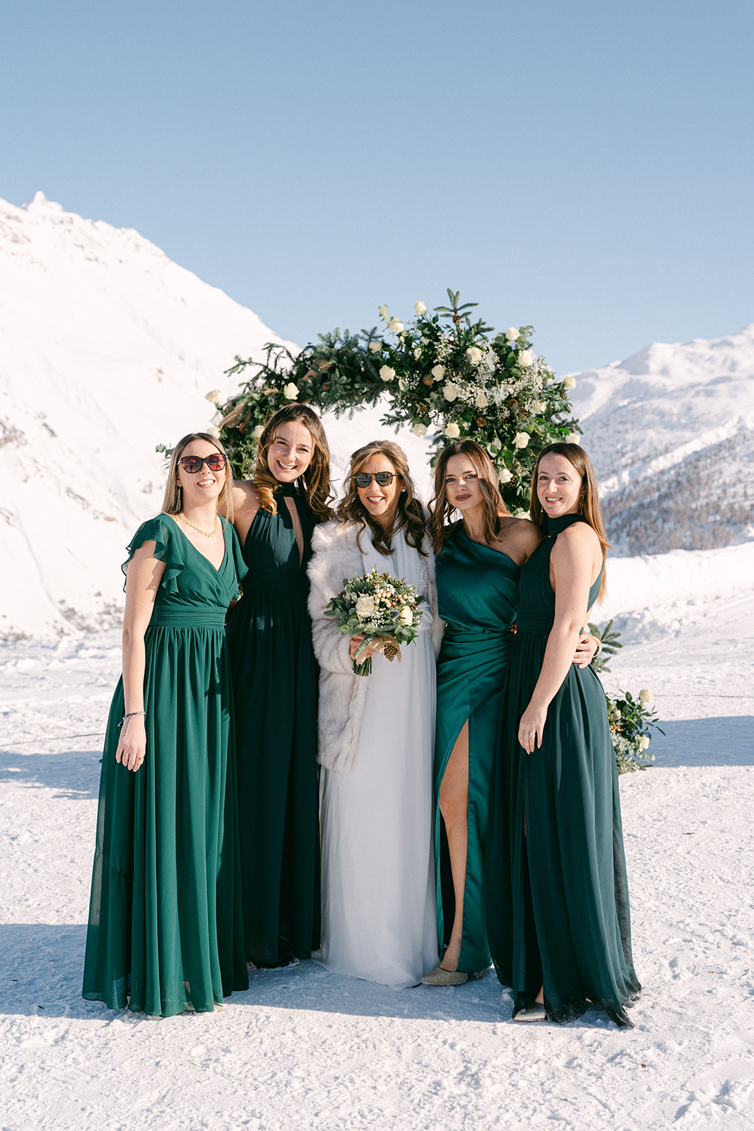 bride and bridesmaids portraits for the snowy wedding