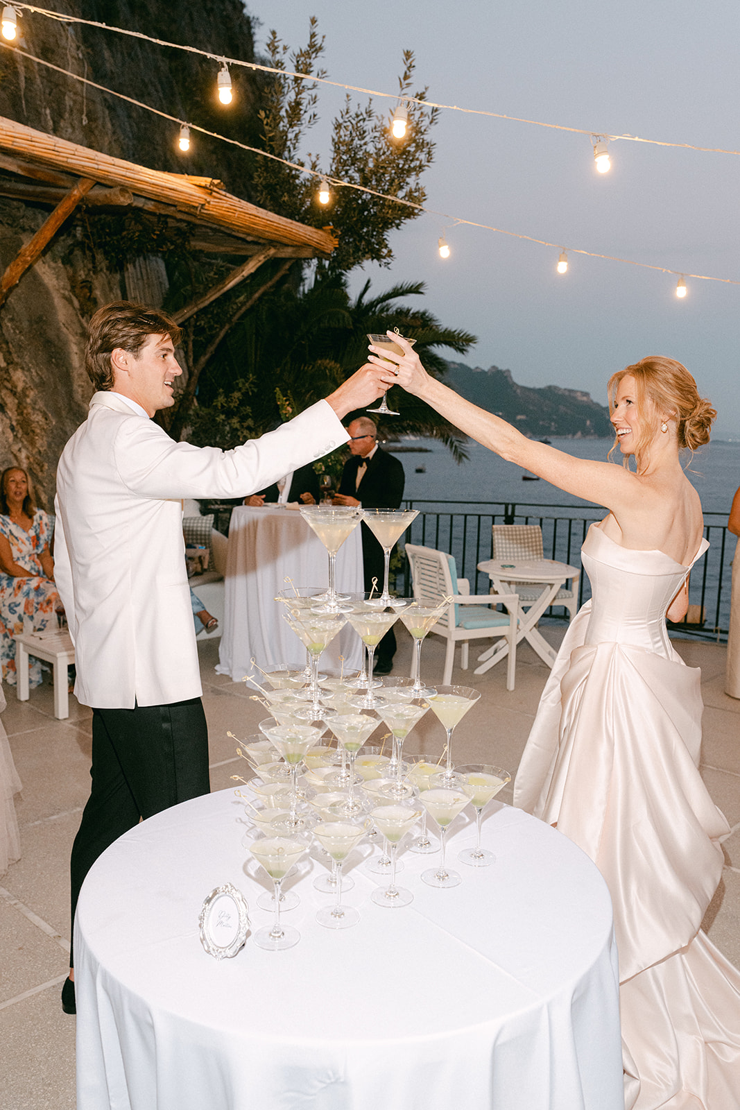 Andrea Gallucci - Destination Wedding Photographer- Amalfi Coast Positano Santorini Barcellona Rome Ravello Paris New York Fun twist on champagne tower — elegant dirty martini tower moment.