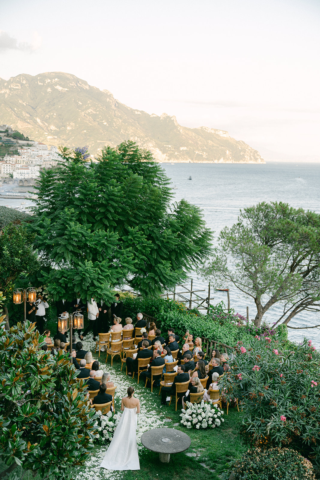 Andrea Gallucci - Destination Wedding Photographer- Amalfi Coast Positano Santorini Barcellona Rome Ravello Paris New York Outdoor wedding ceremony overlooking the Amalfi Coast with ocean views.