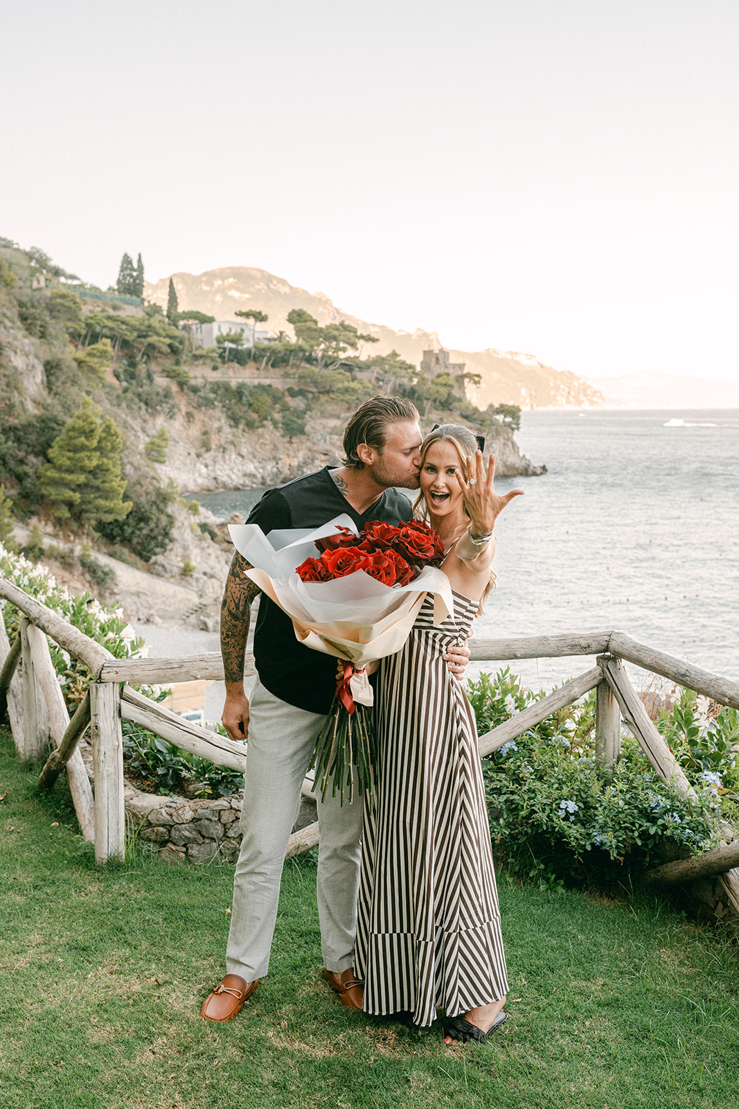 Couple celebrating engagement during Amalfi Coast proposal