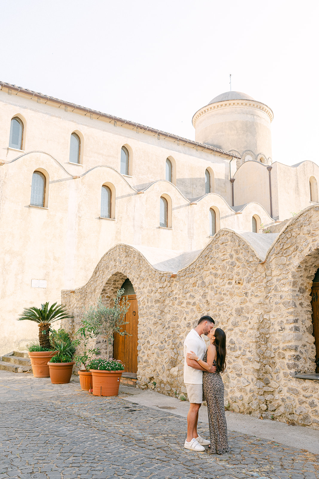 Romantic proposal spot with historical Amalfi Coast background