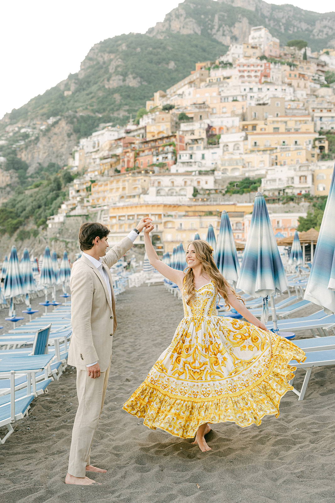 Andrea Gallucci - Destination Wedding Photographer- Amalfi Coast Positano Santorini Barcellona Rome Ravello Paris New York Romantic engagement photoshoot on Positano beach during an Amalfi Coast vacation