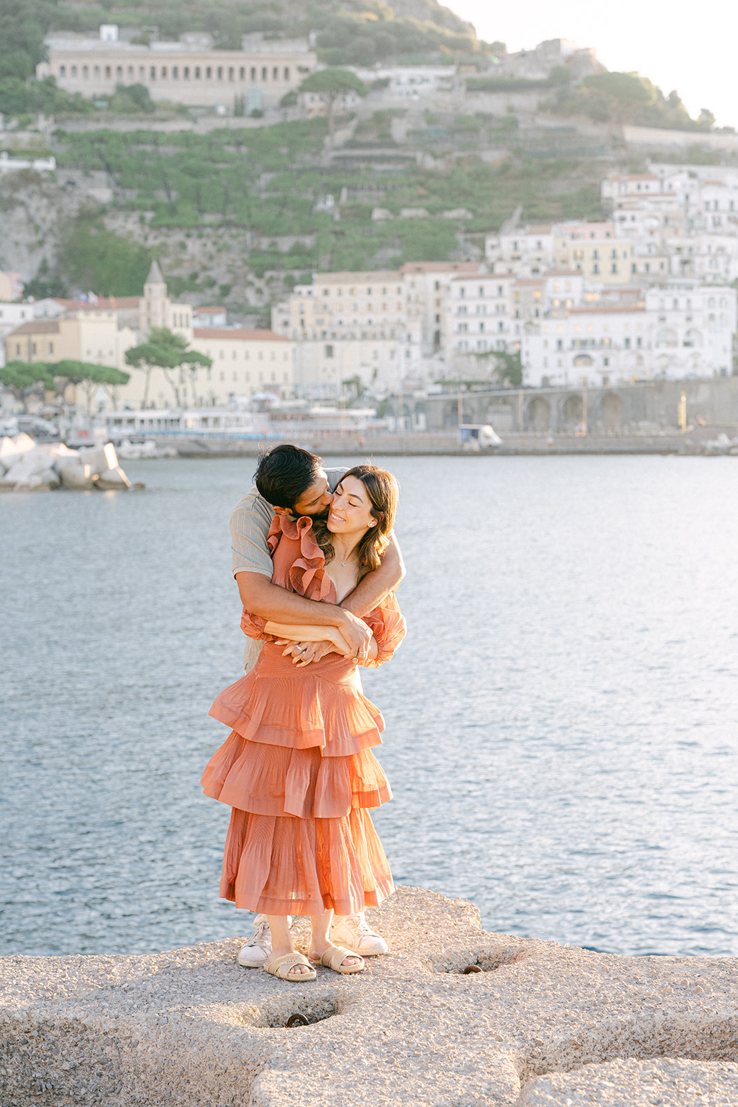 Andrea Gallucci - Destination Wedding Photographer- Amalfi Coast Positano Santorini Barcellona Rome Ravello Paris New York Couple exploring Positano beach during an Amalfi Coast vacation photoshoot