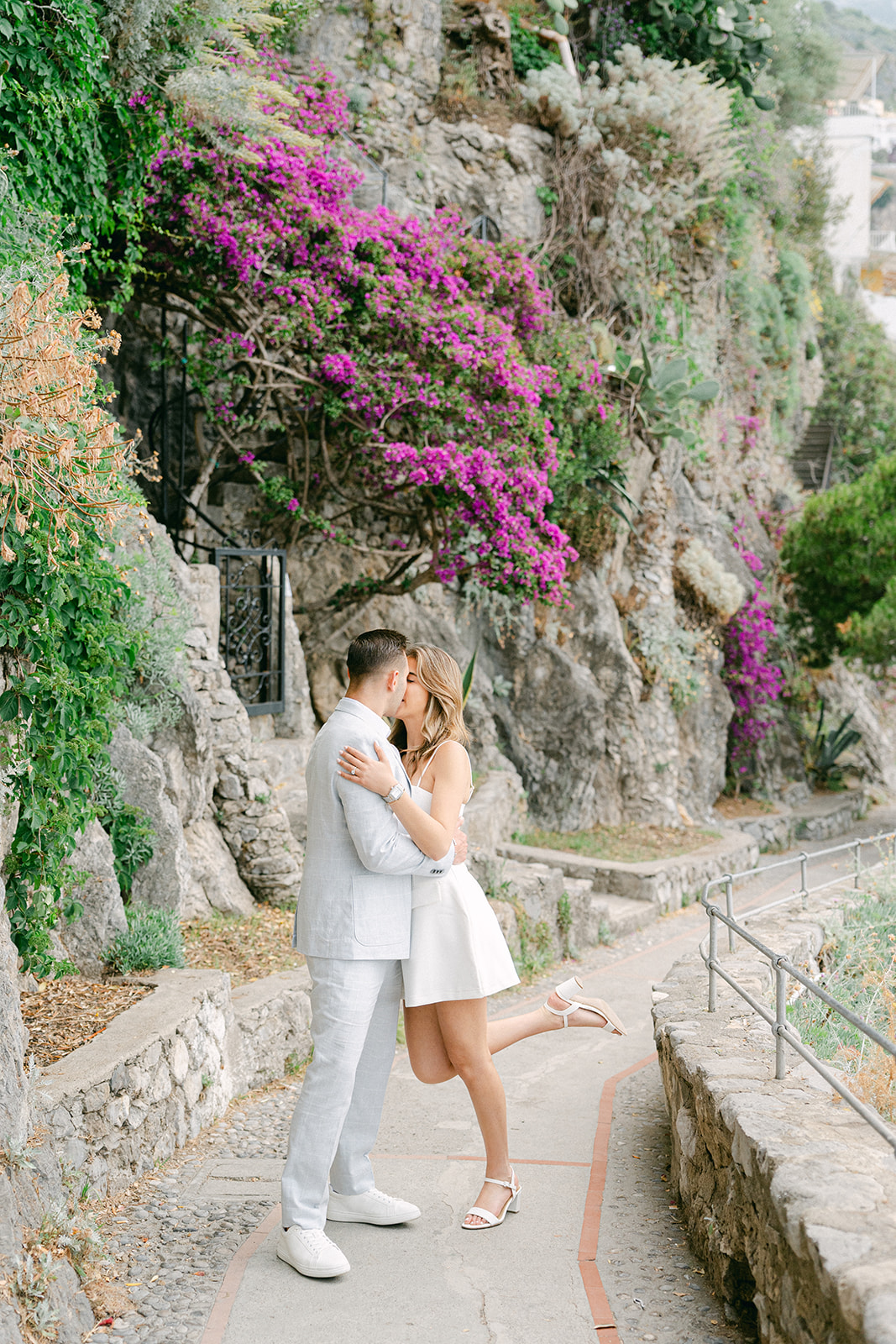 Andrea Gallucci - Destination Wedding Photographer- Amalfi Coast Positano Santorini Barcellona Rome Ravello Paris New York Intimate couple portrait overlooking the Amalfi Coast during vacation photoshoot