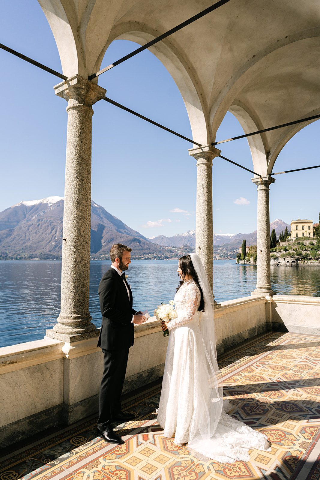 Couple during Lake Como elopement ceremony in Villa Monastero gardens