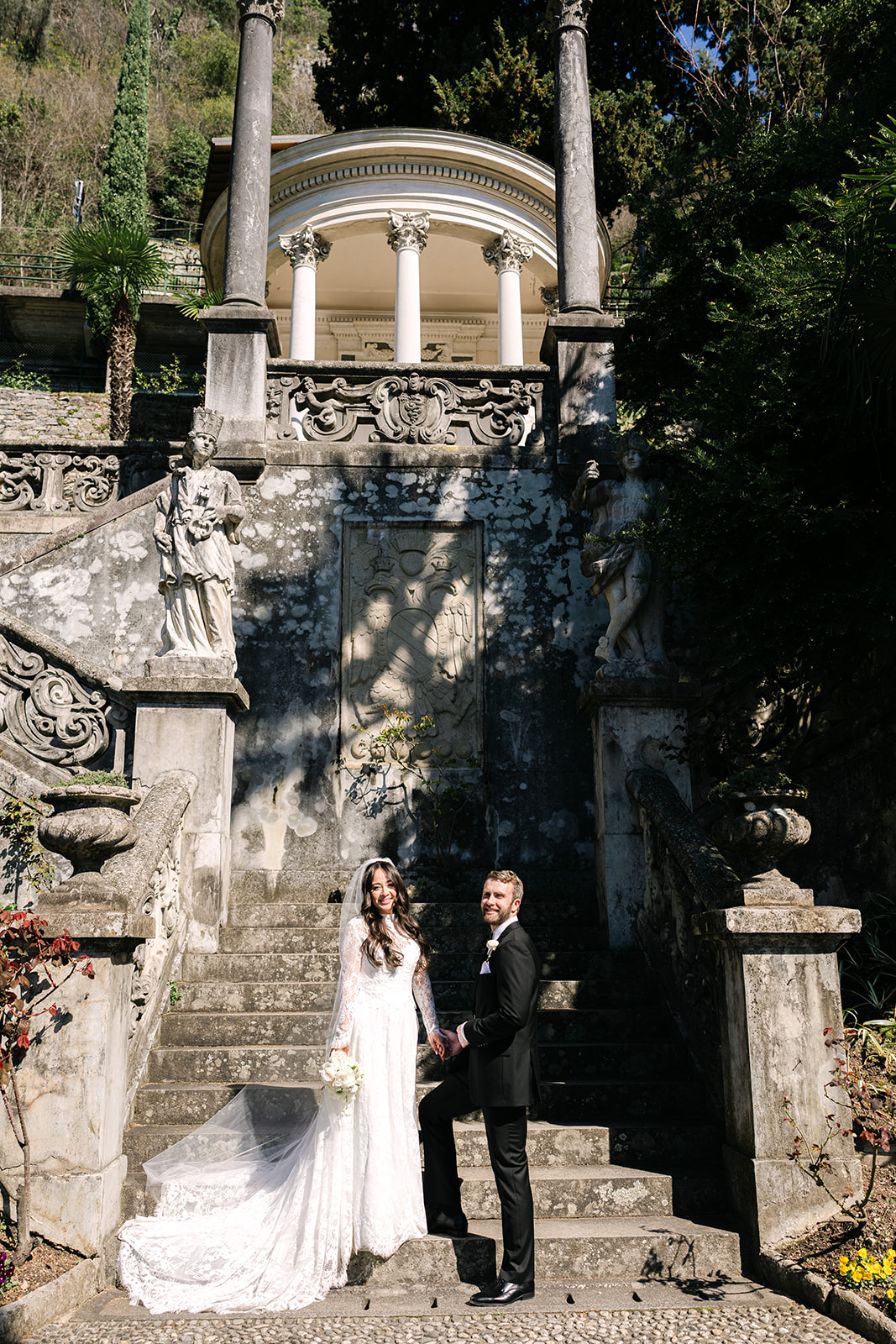 Lake Como elopement couple exploring scenic Italian coastline