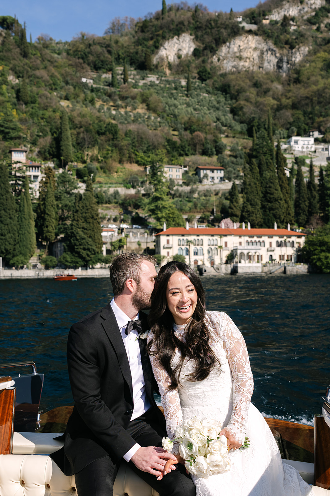 Lake Como elopement candid moment during private boat experience