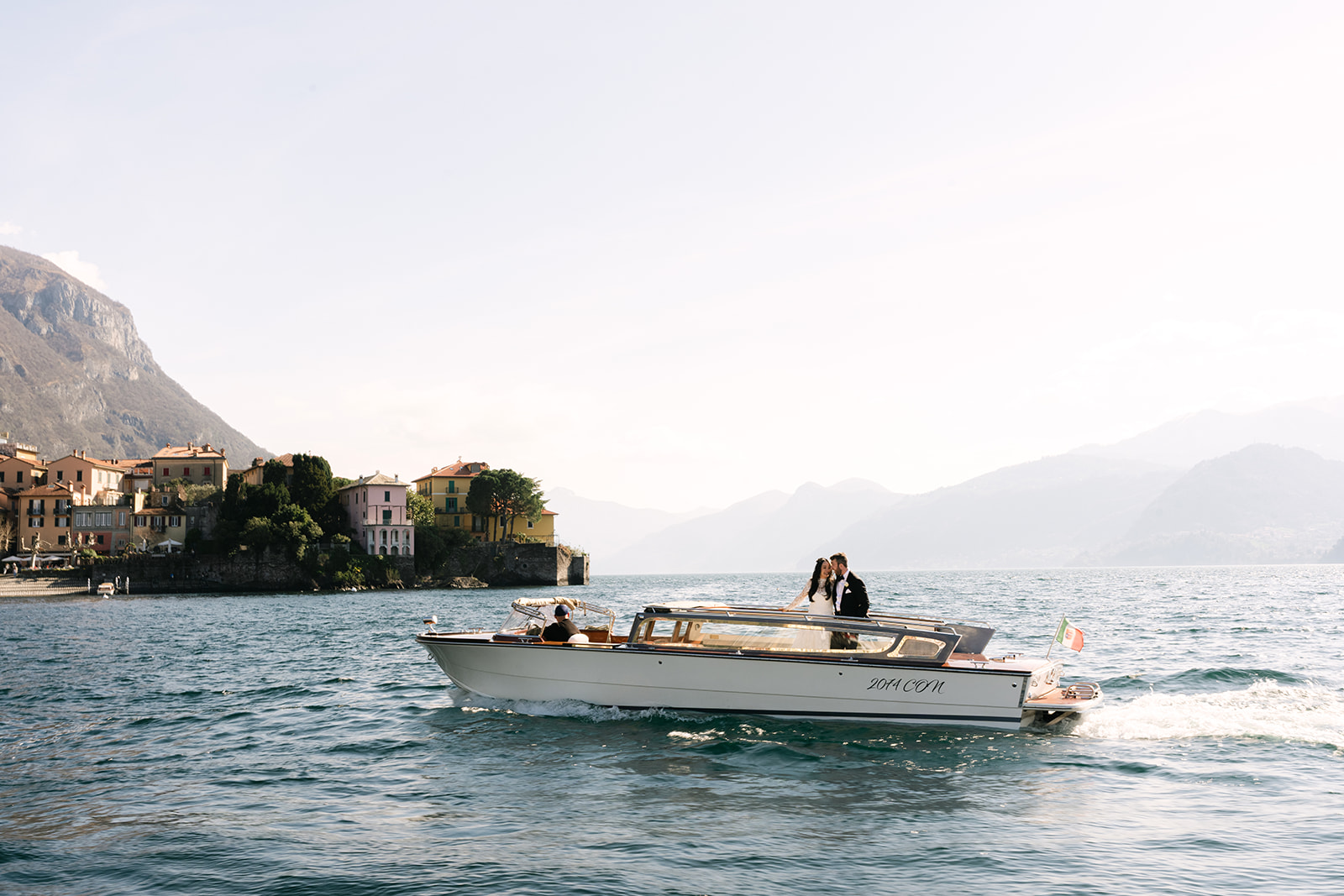 Lake Como elopement candid moment during private boat experience